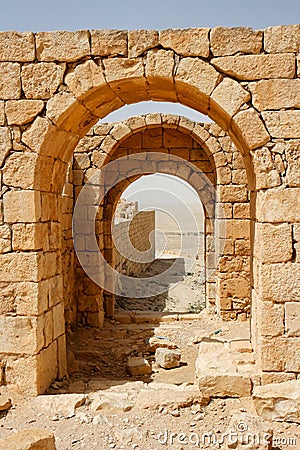Converging ancient stone arches Stock Photo