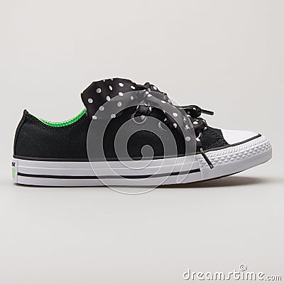 Converse Chuck Taylor All Star Big Eyelets OX black, green and white sneaker Editorial Stock Photo