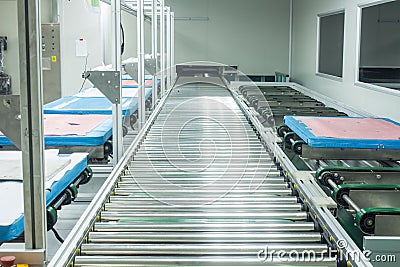 The conveyor chain, and conveyor belt on production line set up in clean room area Stock Photo