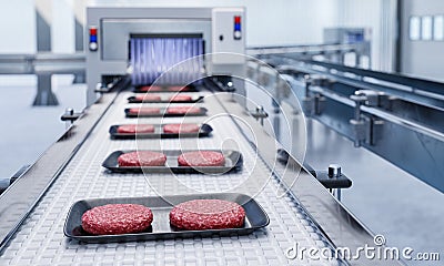 Conveyor in a factory of ready-made beef hamburger patties Stock Photo