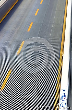 Conveyor safety signs at airport Stock Photo
