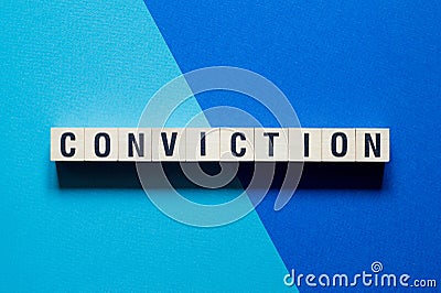 Conviction word concept on cubes Stock Photo