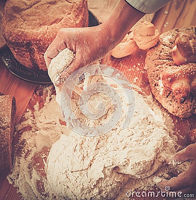 Cook hands preparing dough Stock Photo