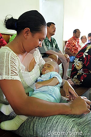 Cook Islander mother holds her baby Editorial Stock Photo