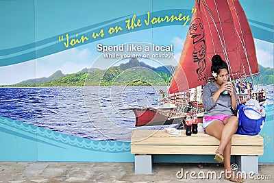 Cook Islander woman eating food in Avarua Rarotonga Cook Islands Editorial Stock Photo