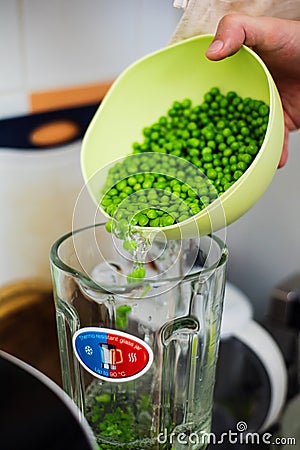 Cook preparing green puree Stock Photo