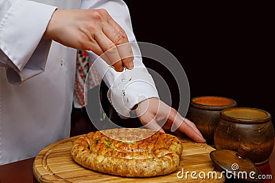 Cook sprinkle sausage seasoning . Stock Photo