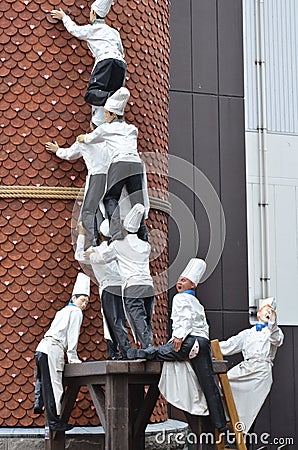 Cook statue was climbing the chimney at Chocolate factory, Shiroi Koibito Park Editorial Stock Photo