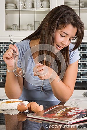 Cookbook reading Stock Photo