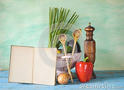 Cookbook, vegetables,old kichen utensils, free copy space Stock Photo