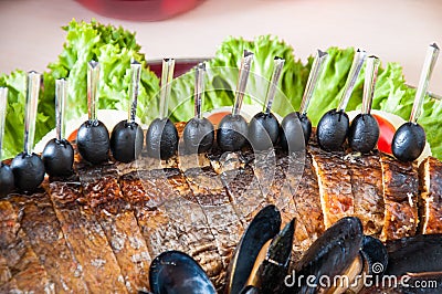 Cooked apetit dish beautifully decorated in a plate on a wooden table, natural light Stock Photo