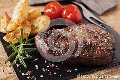 Cooked beef steak sliced medium rare close-up Stock Photo