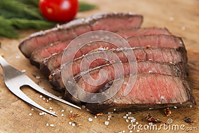 Cooked beef steak sliced medium rare close-up Stock Photo