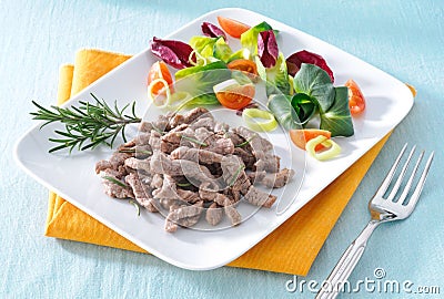 Cooked beef with vegetables Stock Photo