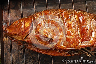 Cooked carp on grill Stock Photo