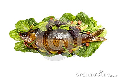 Cooked carp on lettuce leaves. Stock Photo