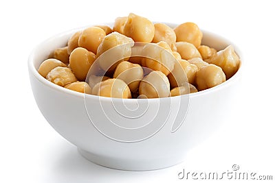 Cooked chickpeas in white bowl. Stock Photo