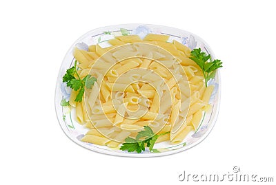 Cooked cylinder-shaped pasta with parsley twigs on a dish Stock Photo