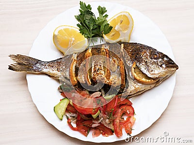 Cooked fish sea bream fish. Stock Photo