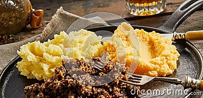 Cooked haggis with neeps and tatties Stock Photo