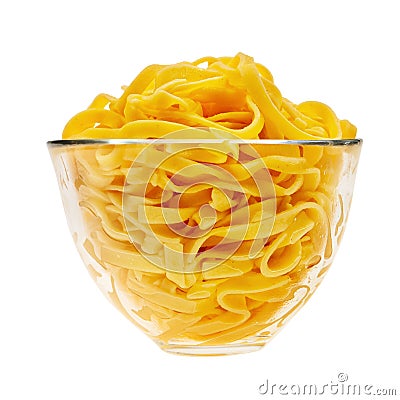 Cooked italian pasta in glass transparent bowl. Stock Photo