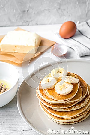 cooked pancake on plate at wooden background Stock Photo