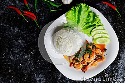 Cooked rice with Stir fried shrimp basil,thai food Stock Photo