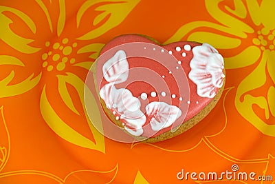 Cookie heart on orange background Stock Photo