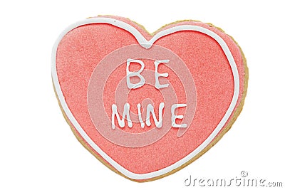 Cookie, Heart shaped biscuit with frosting words be mine Stock Photo