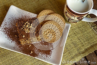 Cookie sponge cake and cup of milk Stock Photo