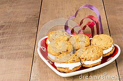 Cookie tray with filled cookies and cutters Stock Photo