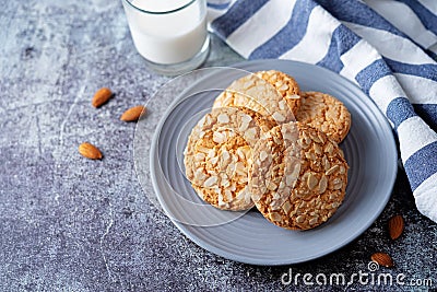 Cookies with almond with glass of milk Stock Photo