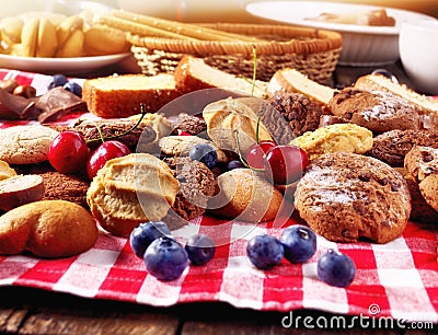 Cookies biscuit with blueberry chocolate bake and cherry cupcake Stock Photo