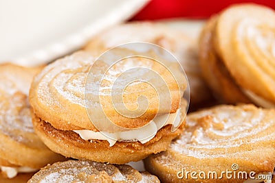 Viennese whirls cream cakes. A close-up view. Stock Photo