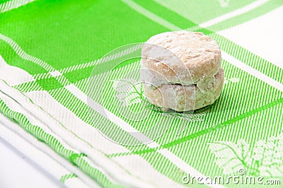 Cookies with powder sugar on a green rag Stock Photo