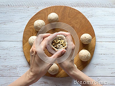 Cooking of Arabic meat appetizer Kibbeh. Stock Photo