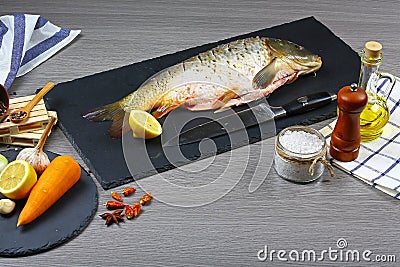 Cooking background, fish on the blackboard, top view. copy text menu Stock Photo