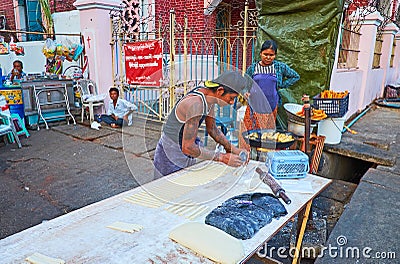 Cooking of Chinese oil sticks, Yangon, Myanmar Editorial Stock Photo