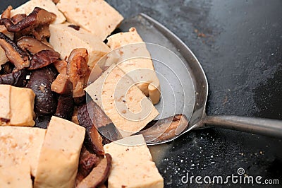 Cooking Chinese style bean curd delicacy Stock Photo