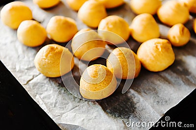 Cooking dessert. A tray with fresh eclair bakery products puff pastry Stock Photo