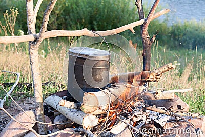 Cooking eat in bowler on the fire in hike Stock Photo