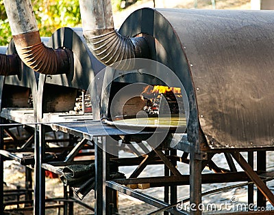 Cooking farinata (Italian food) Stock Photo