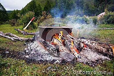 Cooking fish on a fire Stock Photo