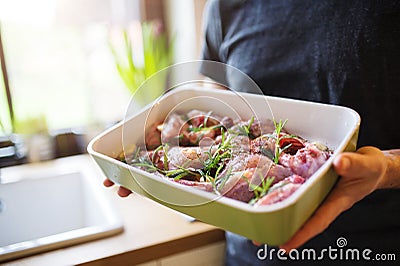 Cooking fresh raw rabbit meat Stock Photo