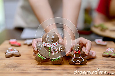 Cooking homemade Xmas cookie for Christmas and Happy New Year. Woman with friend and Family lifestyle on winter holiday Stock Photo