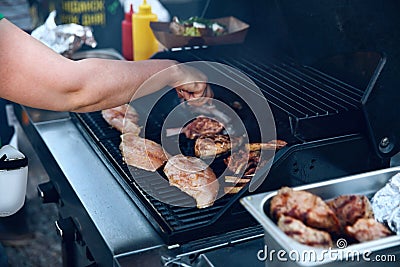 Cooking Meat On Grill Outdoors Closeup. Barbecue Stock Photo