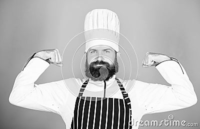 Cooking is my power. Confident bearded strong chef white uniform. Try something special. My secret tips culinary Stock Photo