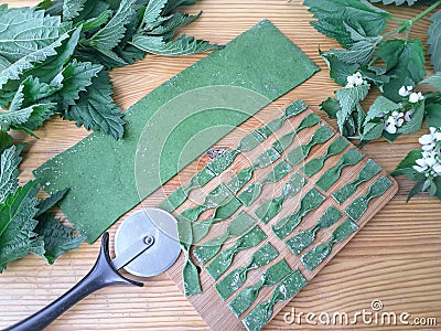 Cooking nettles green farfalle pasta Stock Photo