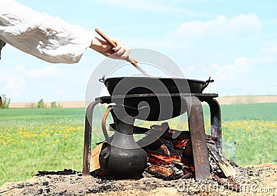 Cooking on opened fire Stock Photo