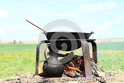 Cooking on opened fire Stock Photo